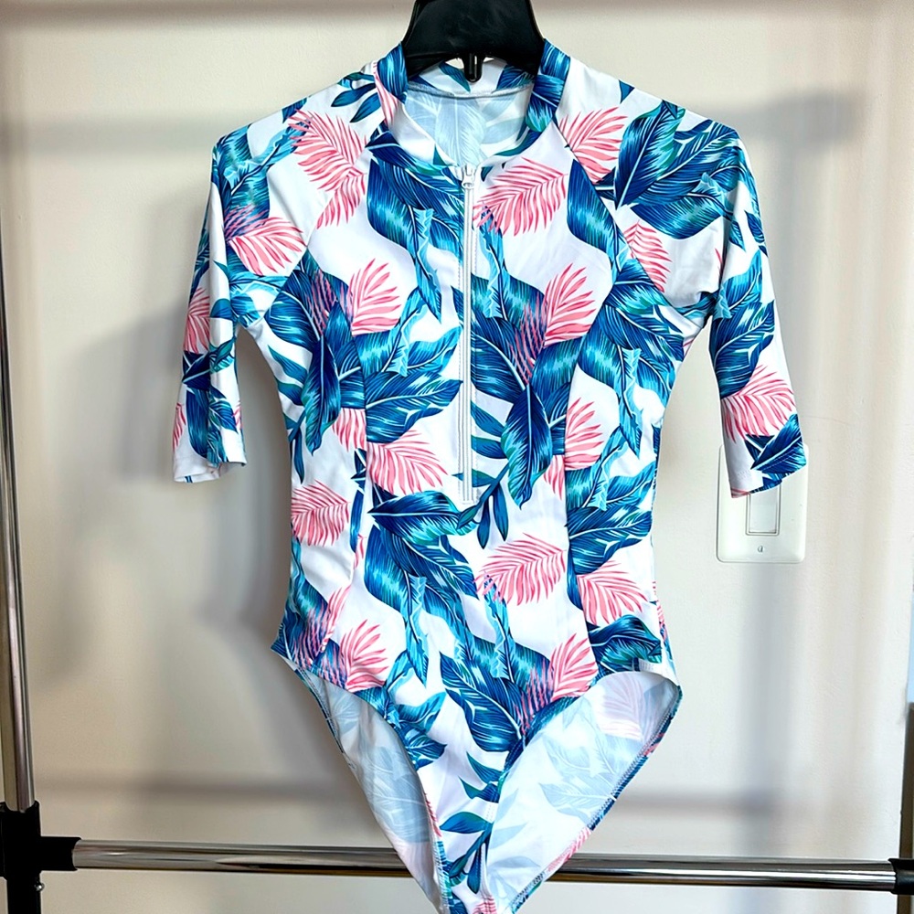 Donating Monday 22nd June closet closing 
Floral Swimsuit Rashguard